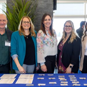 A group of professionals at Clarington Board of Trade networking event, promoting local business and economic collaboration.