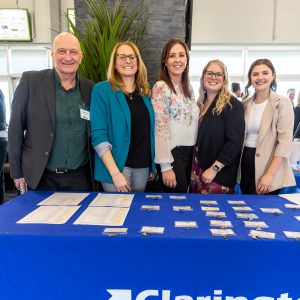 Diverse group of professionals at Clarington Board of Trade event, promoting local business growth and collaboration.