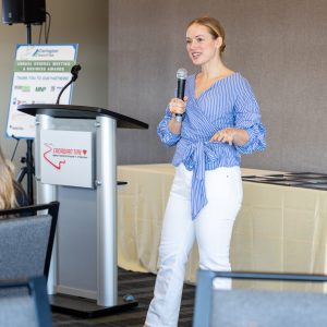 Businesswoman presenting at Clarington Board of Trade meeting and awards ceremony.
