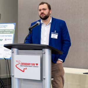 Business professional speaking at Clarington Board of Trade event.