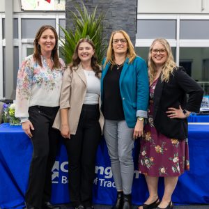 Professional group of women at Clarington Board of Trade event, promoting local business growth.