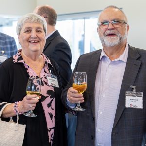 Friendly business professionals enjoying drinks at Clarington Board of Trade event.