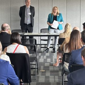 Professional speakers address an audience at Clarington Board of Trade meeting.