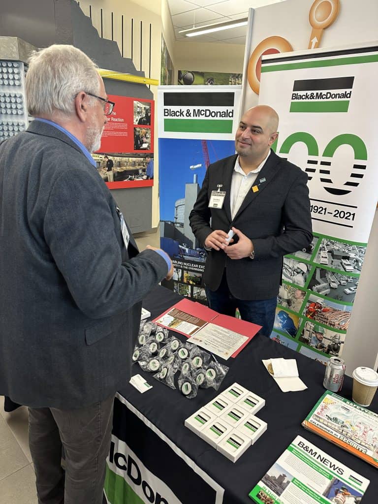 Alt text: Business professionals networking at Clarington Board of Trade event with CBCOT branding.