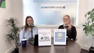 Women podcast hosts at Clarington Board of Trade meeting.