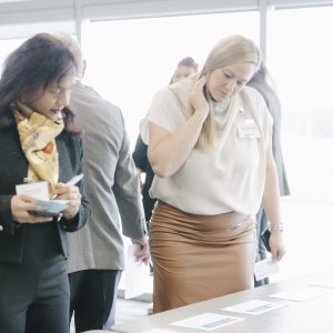 An image of professionals engaging at the Clarington Board of Trade event, showcasing local business.