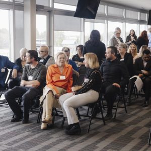 Business professionals networking at Clarington Board of Trade event.