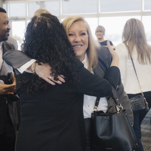 Business professionals networking at Clarington Board of Trade event.