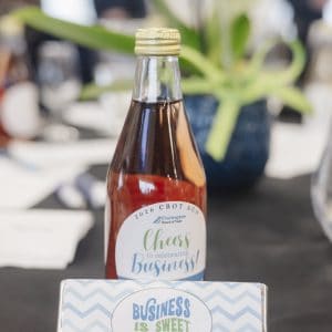 Clarington Board of Trade event with a bottle of cheers beverage on a table.