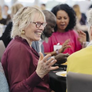 Business professionals networking at Clarington Board of Trade event.