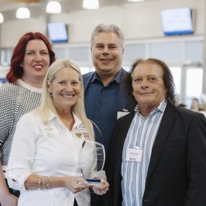 Business professionals at Clarington Board of Trade event in a conference setting.