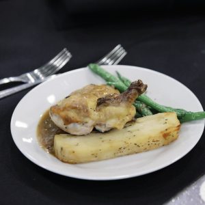 Clarington Board of Trade event with a plated chicken dish and vegetables.