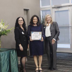 Clarington Board of Trade award presentation with three women smiling.