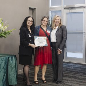 Women receiving award at Clarington Board of Trade event.