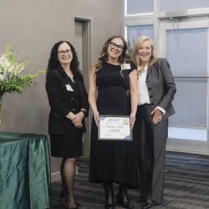 Award recipient at Clarington Board of Trade event, celebrating local business achievements.