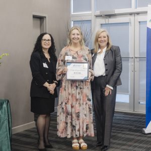 Women receiving award at Clarington Board of Trade event in Ontario.