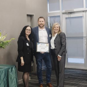 Clarington Board of Trade award presentation with professionals at event.