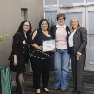 Group of women at Clarington Board of Trade event, celebrating achievement.