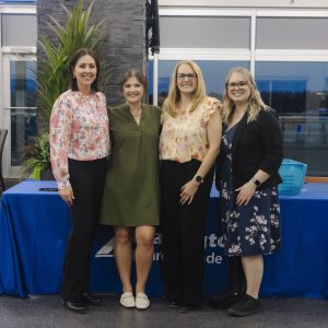 Group of women at Clarington Board of Trade event on a rooftop terrace.
